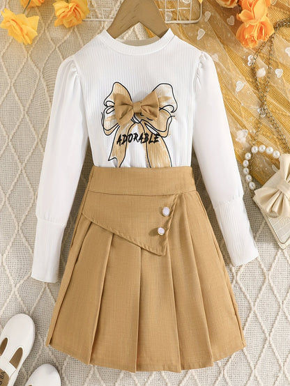 Herbstliches Langarm-Oberteil mit Ballonärmeln, Fliege und Faltenrock-Set.